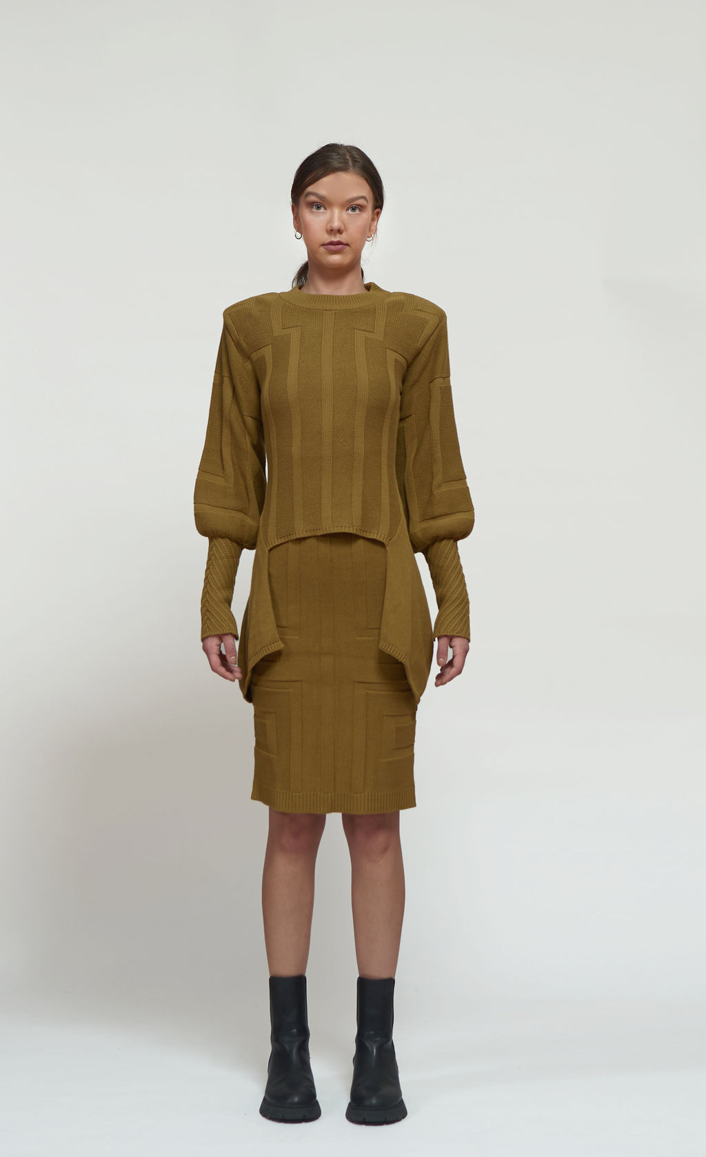 Primakind Kaya Shoulder-padded, two-piece knitwear with a pencil skirt.