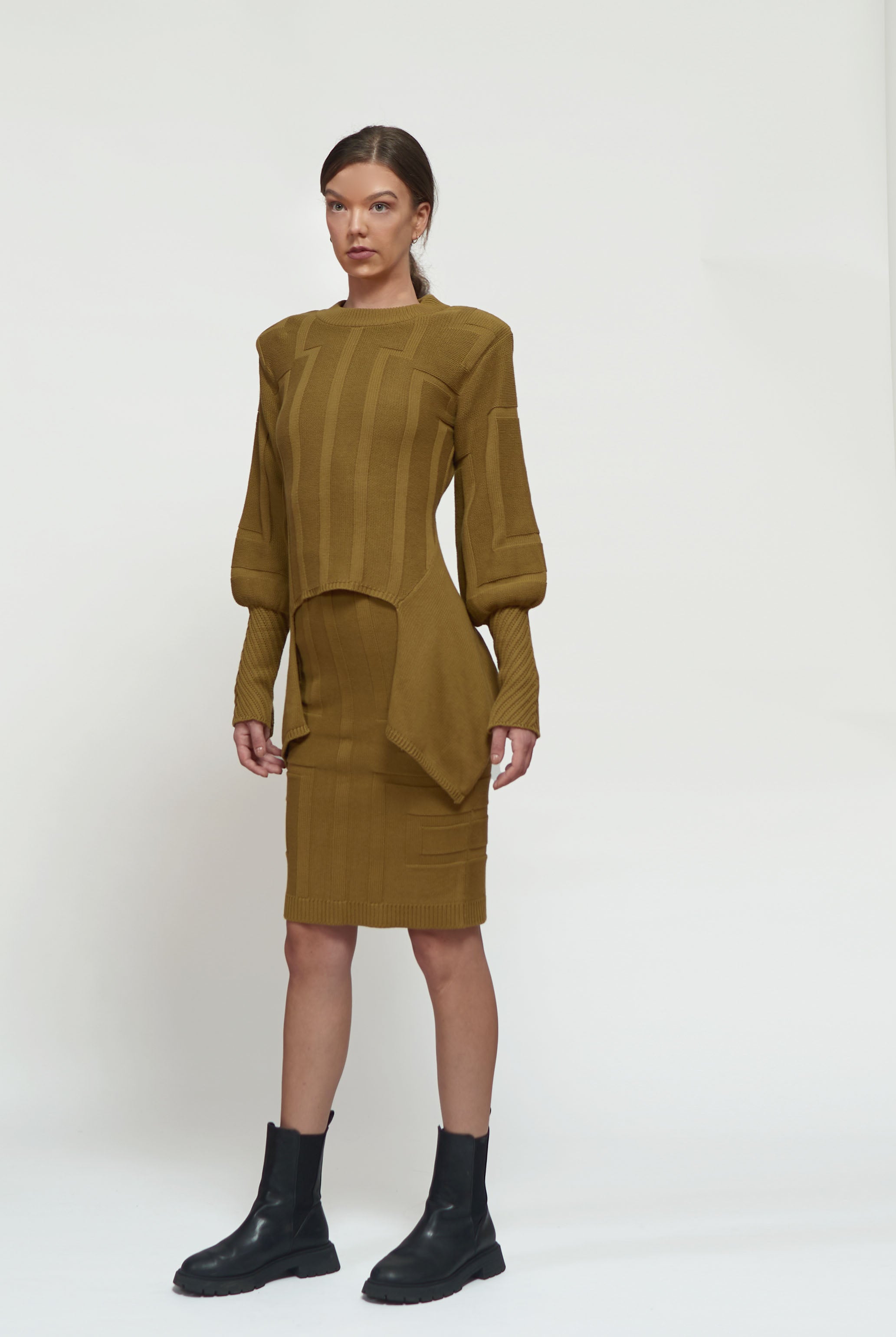 Primakind Kaya Shoulder-padded, two-piece knitwear with a pencil skirt.